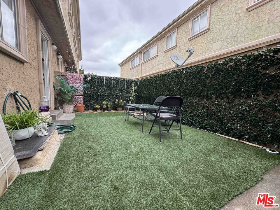 Spacious 3-bedroom, 1.5-bathroom townhouse-style condo within the Forest Glen Villas community. Spacious light and bright unit, remodeled kitchen with granite countertops and good appliances. Tile flooring in the kitchen and bathrooms and stairs and bedrooms are all carpeted. Central AC/Heat and two cars detached covered parking spaces. The unit is in a great gated community, that includes 3 sparkling pools, 2 exercise rooms, a recreation room for private parties, and a playground! The laundry room is next to the kitchen and a door, that leads you out to your private patio, great for outdoor seating. This unit also has a good size patio. Located near the Runnymede Recreation Center, Food 4 Less, Northridge Mall, many dining options, schools, Starbucks, and close to FWY 101 and 118