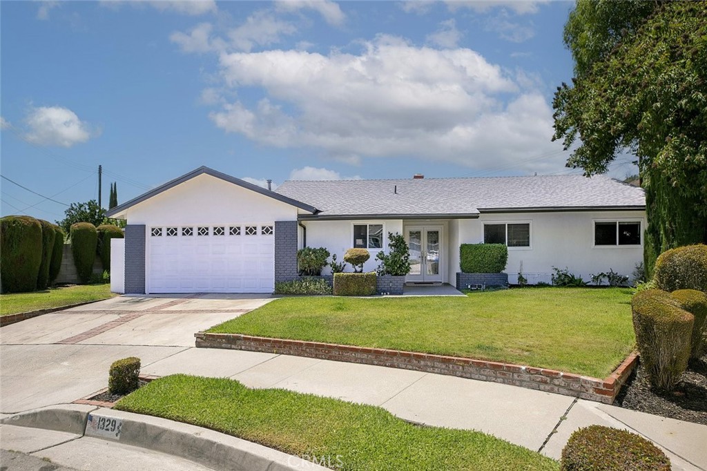 Tucked away at the end of a peaceful cul-de-sac in one of Glendora’s desirable neighborhoods, this beautifully maintained 4-bedroom, 2-bathroom residence offers the perfect blend of comfort, style, and functionality.
Step inside to an open and airy floor plan where a spacious kitchen flows into the expansive family room and dining area—an ideal setup for both everyday living and effortless entertaining. Natural light fills the living space, highlighting its warm and inviting atmosphere.
Step outside to your own private backyard featuring a sparkling pool, cozy fire pit, lush grassy lawn, and a separate covered patio—perfect for relaxing afternoons or lively gatherings with family and friends.
With its thoughtful layout, outdoor amenities, and prime location on a quiet street, this home is truly a rare find. Don’t miss the opportunity to make it yours!