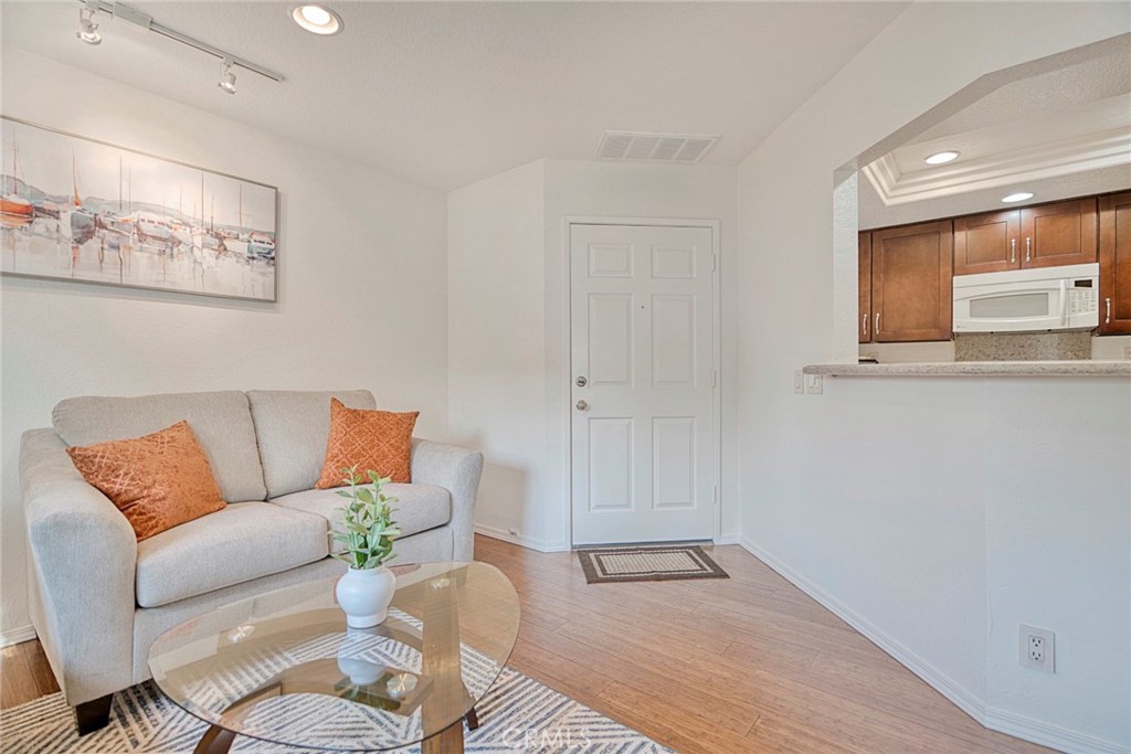 Step into this highly desirable end- unit upper-level home, where natural light fills the open living space designed for both comfort and style. The home features a beautifully updated bathroom, a spacious bedroom with new flooring, and the convenience of in-unit stackable washer and dryer.
Enjoy rare privacy with only one common wall—no neighbors above, below, or on the greenbelt side—creating a serene retreat. Even more unique for a one-bedroom condo, your private single-car garage sits directly beneath the unit, offering both security and ease.
Bordering a peaceful greenbelt, this residence is nestled in a quiet, well-maintained community with access to 3 pools, spas, and a clubhouse. The tree-lined streets enhance the sense of openness and tranquility. With central air conditioning, a thoughtful layout, and a prime location, this home is a standout value in the highly sought-after Crestline community of Laguna Hills!
