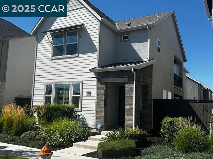 Stunning Plan 3 at prestigious new community, Windrow at The Cove. This two-story home welcomes you with a charming front porch and many upgraded features, and an open great room. The kitchen features white cabinets with matte black hardware, quartz counters, large stainless steel sink, and center-island that is ideal for entertaining guests. Extend your living space and dine al fresco on the outdoor covered patio. Serene Primary suite offers dual sinks, walk-in shower, separate soaking tub, and a generous walk-in closet. This updated unit has a balcony space off the primary bedroom, ideal for your morning coffee or relaxing weekends. A leased solar panel system  has been installed. The nearby Clubhouse includes a Junior Olympic size pool, fitness center, shaded BBQ areas and more all located just a few short minutes from vibrant Downtown Sacramento.