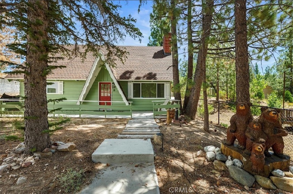 Charming Cabin in a Prime Location! Located near dining, shopping, and year-round activities, this inviting cabin blends rustic charm with thoughtful updates. Inside, you’ll find a warm neutral color palette, dual-pane windows, wood trim, and blinds. The kitchen features beautiful hickory cabinets with self-closing drawers, black appliances, butcher block counters, mosaic tile backsplash, farmhouse sink, and a dining area. The living room boasts vaulted open-beam tongue-and-groove ceilings, a stone fireplace with efficient wood-burning insert, and durable bamboo flooring—perfect for snowy days.
The bathroom is beautifully updated with ceramic tile, a stone countertop, and set up for heated floors. Two main-level bedrooms showcase tongue-and-groove ceilings, mirrored closets, individual wall heaters, and carpet. The loft-style third bedroom offers built-in storage, large windows, and a ceiling fan.
The separate garage includes a washer & dryer area and plenty of storage. Outside, the large lot provides ample parking, mature trees, a fenced backyard, and a spa for relaxing after a day of mountain adventures.
This cabin is the perfect blend of mountain character and modern comfort—ready for your weekend getaway or full-time retreat!