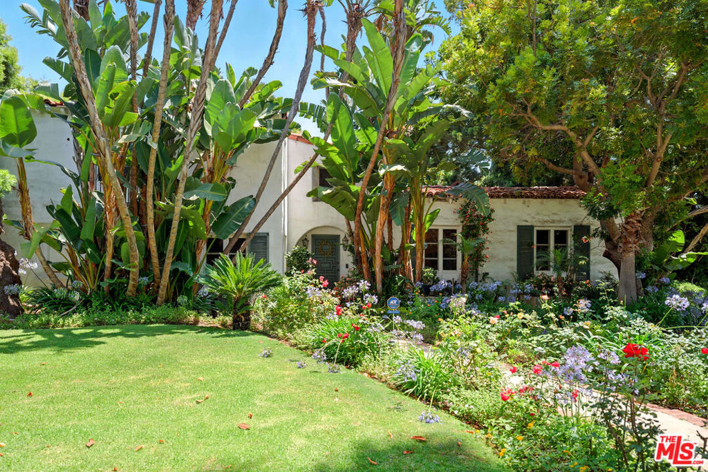 Location, location, location! Please do not contact seller or walk the property directly. A prime and truly rare opportunity to purchase and live in a home in the extremely desirable and much sought after flats of Beverly Hills, walking distance away from best world restaurants, high end Rodeo Drive shopping, parks, etc. on a beautiful palm tree lined street. Approximately 4,700 square feet (incl garage apt) of two story living space including 5 bedrooms, 4 bathrooms, one guest house above garage, and an oversized swimmers swimming pool, on an exceptionally large almost 15,000 square foot lot in the heart of the top rated Beverly Hills School District. Full of potential, and very livable as-is with the opportunity to update to your own taste over time. Enjoy two fireplaces (living room & primary bedroom), central A/C, fantastic pool and more! Property Features layout with great separation of space, has built-ins and ample storage. 3 car garage with private storage area. On-site laundry room, courtyard, pool and BBQ area for relaxation and entertaining. Walking distance to Beverly Hills everything!