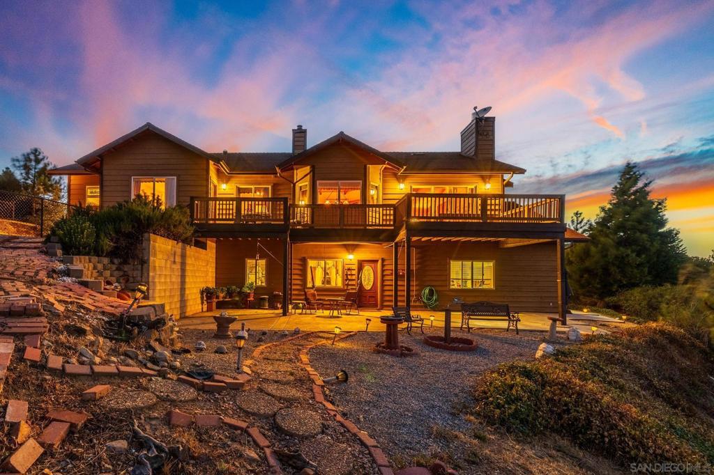Take in sweeping, unobstructed views of the Anza Borrego Desert State Park from nearly every room of this ~2,853 sq. ft. home on 4.49 acres. Sunrises, desert vistas, and endless star-filled skies (Julian is a designated Dark Sky community) create a truly unique setting that can be enjoyed year-round. Located just 5 minutes from Main Street’s shops, restaurants, breweries, and wineries, this home offers both privacy and convenience. The interior features 2 spacious bedrooms upstairs, plus an office that can easily serve as a 3rd bedroom. A beautiful kitchen opens to the dining room, perfectly positioned to capture the panoramic views while you cook and entertain. Additional spaces include 2 bathrooms, a laundry room, storage room, and a flexible bonus area currently used as a bar—ideal for hobbies, entertaining, or relaxation. Whether as a full-time residence or weekend getaway, this home blends the serenity of mountain living with modern comfort. From daytime desert views to breathtaking stargazing at night, every moment here is framed by the natural beauty that makes Julian so special. Julian is a charming historic town nestled in the Cuyamaca Mountains, about an hour east of San Diego. Known for its small-town charm, gold rush history, and famous apple orchards, Julian is a popular getaway for those looking to enjoy fresh mountain air, scenic landscapes, and a slower pace of life. Real estate in Julian ranges from historic cabins to modern mountain retreats, making it an ideal location for those looking for a peaceful, nature-filled lifestyle with easy access to San Diego and Orange County.