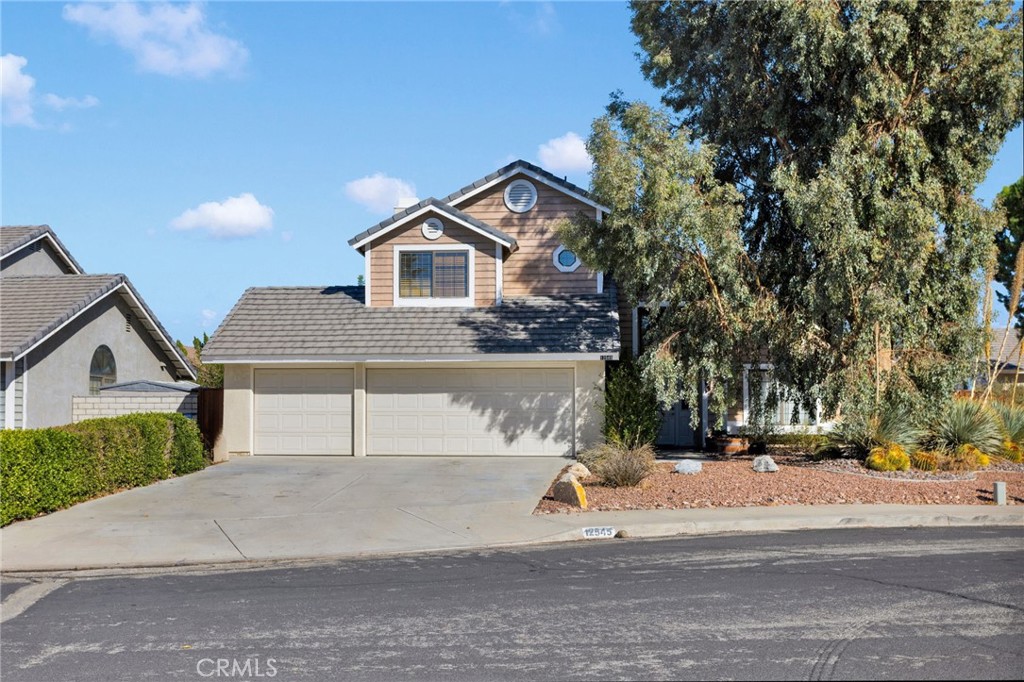 Welcome to 12545 Ironstone Ct, a beautiful home tucked away on a quiet cul-de-sac in one of Victorville’s most popular areas. This property checks all the boxes, a 3-car attached garage, tile roof, and full landscaping with mature trees and garden beds that give it great curb appeal. Inside, you’ll find vaulted ceilings, a comfortable family room, and a living room with a cozy fireplace that flows nicely into the dining area. The kitchen features clean white tile counters and plenty of natural light, making it both bright and functional.
There’s also a dedicated office in addition to the bedrooms, some new flooring, and an indoor laundry room with built-in cabinets. The master suite is huge, offering plenty of space to relax and unwind. Located close to the Mall of Victor Valley, shopping, schools, and the I-15 freeway, this home is truly turnkey and move-in ready.