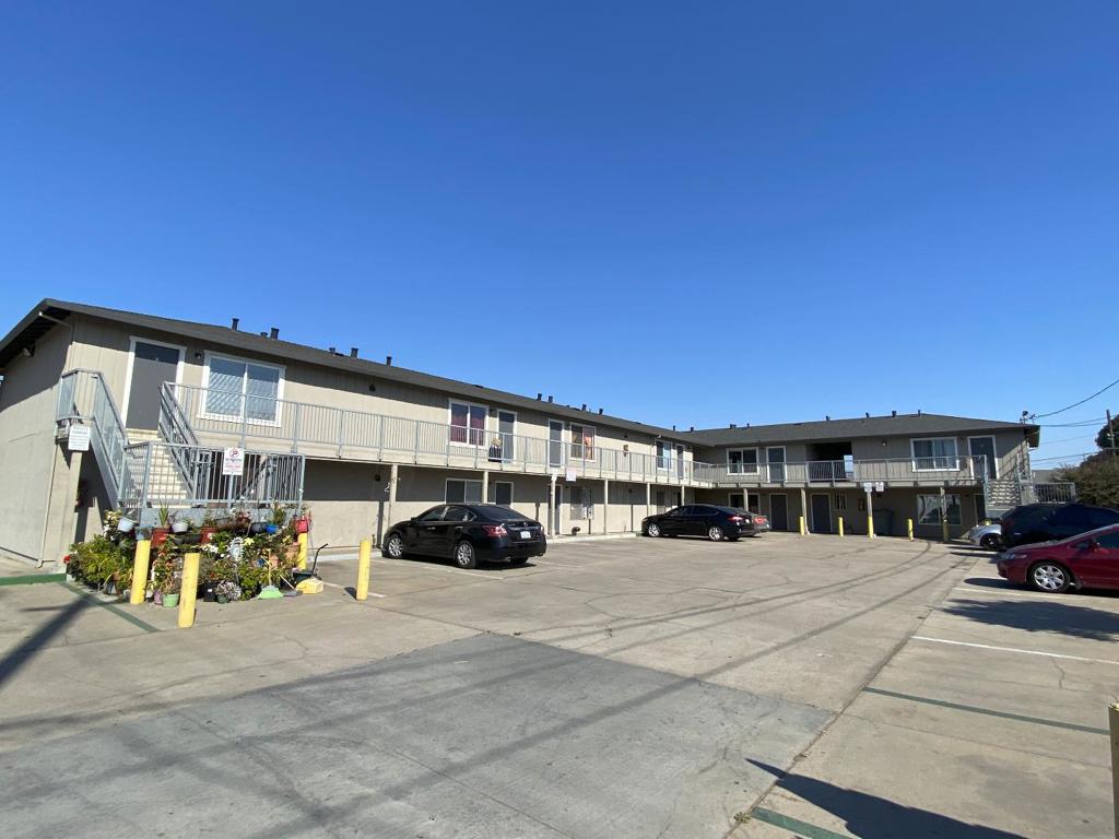 This 14-unit apartment complex delivers many investor positives which will increase your investment return. The unit mix features all two-bedroom / one-bathroom units with a $2,100 monthly average rent. Market rents are $2200 plus. Capital improvements include: new asphalt comp roof 2018, exterior painting 2018, catwalk repairs, new stainless steel stairs and handrails, security lights, complete main electric panel replacement, and individual unit water shutoff valves. Interior capital improvements include 12 remodeled units with new kitchens, appliances, flooring, and bathrooms. These capex items will reduce potential insurance premium increases, improvement requirements, and future capital investment. Exterior maintenance is minimal. The complex also has 18 off-street parking spaces.