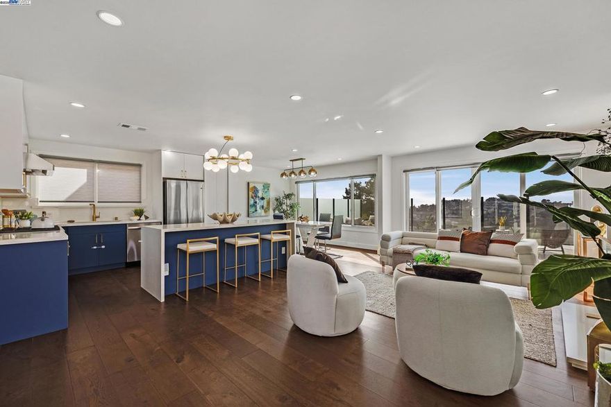 Gorgeously reimagined, gut-renovated, and expanded. This turn-key, fully detached house offers 4 bedrooms, 3 modern baths.  Designed for today's modern family living with upstairs - beautiful open-concept floor plan - kitchen, dining area, living room over look sweeping sunset and panoramic view. The stunning kitchen features stone waterfall island and full slab backsplash, quality brand name stainless steel appliances, trendy bi-fold lift up kitchen cabinet doors with gold cabinet handles, engineered hardwood floor. Living room with cozy fireplace leads to outdoor expansive deck includes 5-foot glass windscreen for comfort and view. Smart home features voice controlled Philips Hue multi-color changing recess lightning, and motorized window shades.  Street level downstairs 1 bedroom, office/bedroom, bathroom, work out gym in flex room, and with an extra bonus sweeping view lounge area for inside holiday family gathering during the cold winter days. Custom closet organizer in bedroom. 1 attached garage with epoxy floor and plenty of street parking, smart garage door controlled via phone app/Tesla screen/or remote. Spot view of Twin Peaks from room. Tankless electric water heater, gas central heating hook up to Google home, so much more to see. Nearby Hiking trails to Twin Peaks.