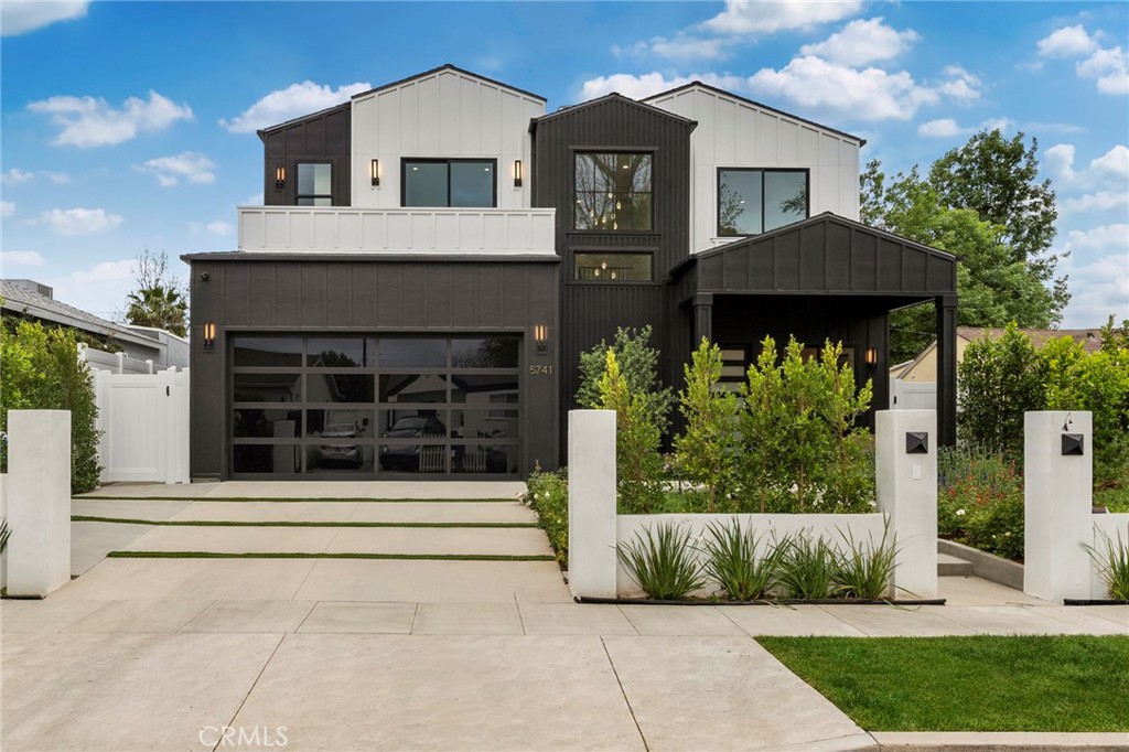 Come see this beautiful and luxurious home in the desired quiet neighborhood of Encino! This home offers an unparalleled combination of modern design elements and top notch finishes perfectly curated. Once you enter this smart house you can control the speakers, sound system, cameras, and lights from your smartphone. You will be blown away with the modern style of the engineered wood floors and clean lines. This impressive home spans around 3,400 sqft of luxury living and features bedrooms with ensuite bathrooms. As you walk around you are greeted by soaring high ceilings and expansive glass doors leading into an open courtyard great for entertaining. Featured on the main level is a 2 beds, 2 baths ADU with a separate entrance- great for home office, guests, additional income and more! Gourmet chef's kitchen is finished with top tier appliances, marble countertops with a huge beautiful island. The indulging main suite awaits boasting a lavish bath, walk in shower, soaking tub, big walk-in closet, and an oversized balcony. The backyard is a true oasis displaying lush landscaping throughout, a built-in BBQ and beautiful grassy area. Located close to Ventura Blvd. with the best shops and restaurants just moments away and ease to freeways. A truly remarkable home that exceeds all expectations and unlike any other home on the market.