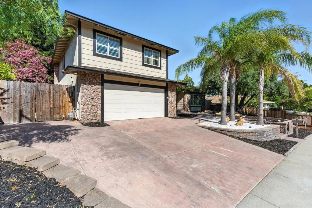 Spacious two-story single-family home located in the desirable Woodland Hills neighborhood of Pittsburg. Situated on a large lot with a private backyard, swimming pool, and hot tub, this home is perfect for summer entertaining and relaxed family living. Inside, the well-designed layout offers five bedrooms and 2.5 baths, with one bedroom conveniently located downstairs ideal for guests, a home office, or multi-generational living. The remaining bedrooms, including a spacious primary suite, are located upstairs. Enjoy hardwood flooring upstairs and tile flooring downstairs throughout the home.. The kitchen is equipped with modern stainless steel appliances including a gas range, microwave, and dishwasher ideal for home chefs. Multiple dining options include a formal dining room, breakfast nook, or the option to dine al fresco in the beautiful backyard. Additional features include central AC and heat, a convenient indoor laundry area, and an attached 2-car garage. This home checks all the boxes for comfort, convenience, and lifestyle.
