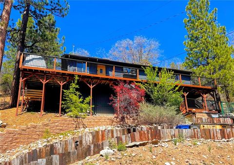 Photo of 1231 Ridge RD, Fawnskin, CA 92333 (MLS # IG26103537)
