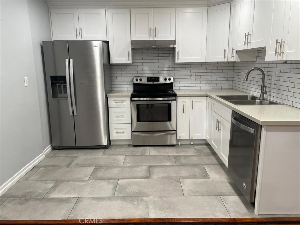 Totally remodeled condo at first floor with a lager Patio for relaxing. Custom designed bathrooms. All remodeled kitchen. Brand new Air conditioning. Custom made solid wood shade throughout the condo. Recessed lighting. Dimming lights throughout the condo. Huge wake-in storage closet. Very large patio for entertaining and relaxing has water hose. End unit is very close to the parking. One carport space and 1 parking spot in the uncovered/gated back lot.
HOA dues include Water, trash, sewer, Internet, basic cable and EQ insurance. Complex has 3 Pools, 3 Spas and kids play area.