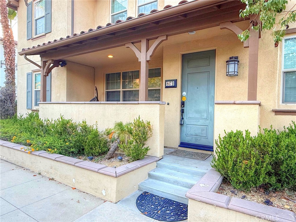 Major Price Reduction for quick sale. This is one of the largest unit in this model with an open loft upstairs. Welcome to an exceptional opportunity to own a highly sought-after residence in the Rosedale Community of Azusa! This South-Facing almost like new Italian style Townhouse consists of an open floor plan for Living Room, dining room, Kitchen, a luxury Bedroom downstairs with a Full Bath convenience for Senior or Guests plus a Laundry Room and 2-Car Garage complete the Main Floor. The 2nd Floor has a gorgeous Master Bedroom, a generous size Bedroom next to a Bathroom plus a very spacious loft/sitting area for family gathering can be used as an Office. This lovely home with premium upgraded of beautiful Wood Floor throughout the entire Unit. Enjoy over 2,000 square feet of spacious Living Space and High Ceilings, Seamlessly Open Floorplan, plus spacious Kitchen with Center Island, and many many more. Resort-style amenities include clubhouse, fitness center, swimming pools, spa, outdoor fireplace, BBQ, playground. Minutes of walking distance to Community Colleges such as Citrus College and Azusa Pacific University plus supermarkets, restaurants, coffee shops, banks, and public transportation. Don't miss out the opportunity to experience the pinnacle of California living in this meticulously maintained home!