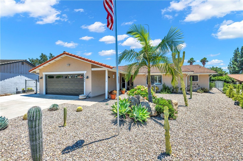 WELCOME HOME to this beautifully updated and remodeled home nestled in the heart of Escondido, with panoramic views and R/V parking. This VERY clean and move-in ready residence offers a bright and open floor plan, with stylish finishes and modern upgrades throughout. The kitchen features sleek quartz countertops, updated cabinetry, and stainless steel appliances, flowing seamlessly into the living and dining areas. Step outside to your EXPANSIVE outdoor covered California room, perfect for year round entertaining. Complete with a built-in BBQ and plenty of space to relax, dine, and enjoy the sweeping views, this backyard is a true extension of the home. Whether hosting guests or enjoying a quiet evening, the outdoor space sets the perfect tone. Recently added upgrades include: HVAC, kitchen appliances, tank-less water heater, sliding doors, BBQ, whole house water filtration system, garage door opener, and whole house fan. With a TURNKEY interior, scenic views, and an entertainer’s dream backyard, this GEM is ready to welcome you home!