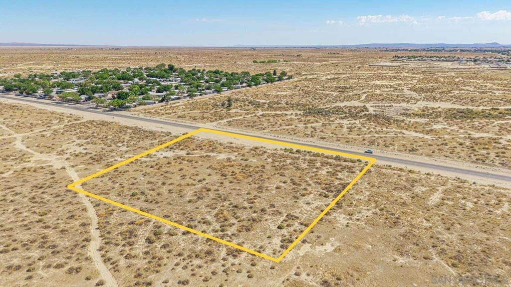 This 2.03-acre lot in Lancaster, Los Angeles County, CA offers the space and flexibility to create your ideal residential retreat! With paved road access, it combines convenience with a peaceful off-grid lifestyle, making it an excellent choice for those who value both privacy and accessibility. The property is zoned for residential use, giving you the opportunity to design a home that fits your needs. Located near key local amenities, the lot sits within reach of Lancaster’s shopping centers, schools, and parks. Nearby attractions include the Prime Desert Woodland Preserve, Antelope Valley Winery, and Lancaster National Soccer Center, offering recreation and leisure close to home. This property provides a balance of open space living with easy access to everything the city has to offer!