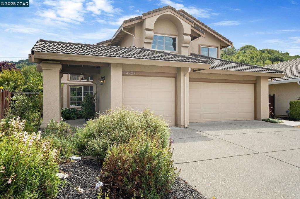 Open Thurs 4-7PM! Nestled in the peaceful Carriage Hills neighborhood of El Sobrante, this 4-bed, 3-bath home blends elegant design with serene surroundings. Set against rolling hills and mature trees, it offers a private retreat just minutes from shopping, dining, and daily essentials.Inside, a light-filled living room and formal dining area showcase views of the lush, park-like backyard. The expansive, FLAT lot invites endless possibilities—whether it’s a pool, ADU, or garden oasis.The updated kitchen features granite countertops, stainless steel appliances, bar seating, and a sunny breakfast nook overlooking greenery. A cozy family room with a modern gas fireplace opens to the private patio through sliding glass doors, offering seamless indoor-outdoor living with no rear neighbors and hillside views.A main-level bedroom and full bath provide flexibility for guests, extended family, or a home office. Upstairs, the spacious primary suite offers a spa-inspired bath and walk-in closet—the perfect place to unwind. Enjoy nearby trails at Kennedy Grove, San Pablo Reservoir, and Pinole Valley Park, or stay active at Lakeridge Athletic Club. With easy freeway access and nearby Orinda BART! .Additional highlights include a 3-car garage and beautifully landscaped grounds!