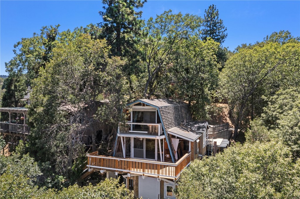 *WATCH VIDEO TOUR FOR EPIC VIEWS!* Escape the city- one project at a time! Calling all weekend warriors and DIY dreamers. Tucked away in the charming mountain town of Crestline, this fixer upper cabin is your blank canvas to create the ultimate getaway. With a few unfinished projects and a little modernization, it's the perfect opportunity to bring your tools, your creativity and your weekend hustle to life. Imagine sipping your coffee on your future deck, surrounded by pine trees and mountain air. Whether you're looking to craft the ideal vacation home, future Air BNB or personal escape, this property has the bones to become something special. Sold as is and priced to move- this is your chance to invest in mountain lifestyle without the turnkey price tag.