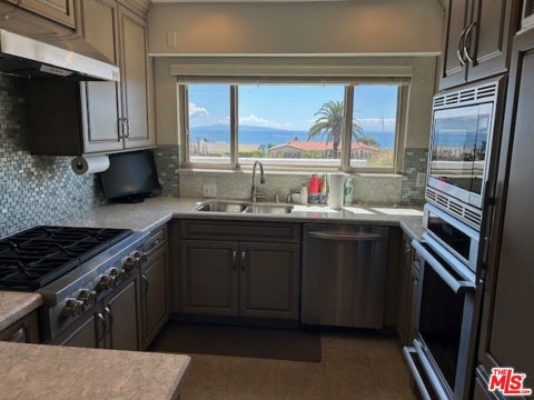 Photo of 3908 Castlerock Road, Malibu, CA 90265 (MLS # 26766085)