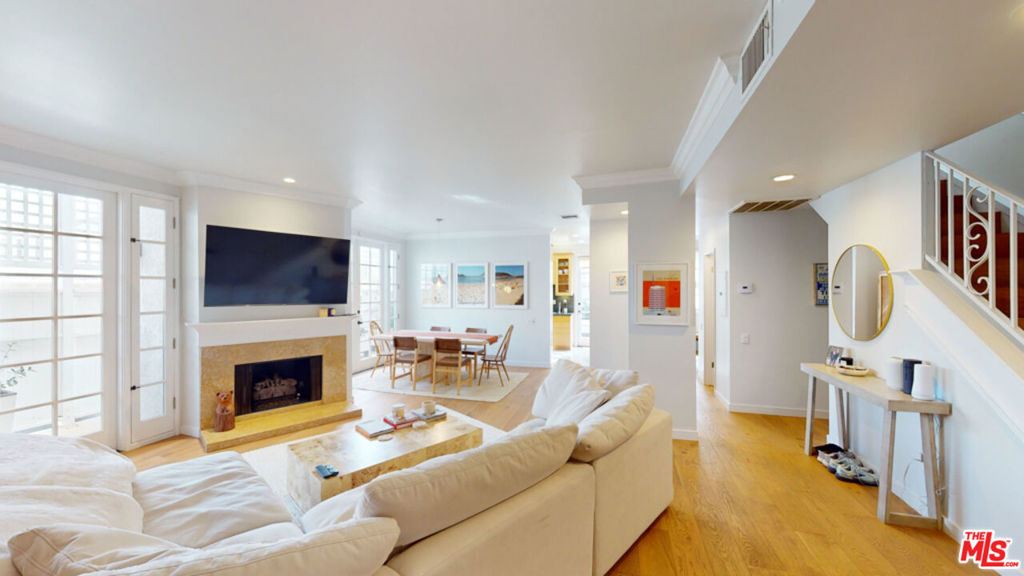 After extensive improvements, we reintroduce this 4BR, 5BA + a custom heptagonal office with views. This modern/contemporary 4,018 sq/ft Sunset Park home offers a superb living with grand ceilings (26') and abundant natural light. Nestled in a serene cul-de-sac, this residence is a retreat from daily life and convenient to amenities. Step inside to a grand foyer highlighting the home's spacious layout. The main level is designed with family living and entertaining in mind. The family room, serving as the home's central hub, features a wood-burning fireplace adding warmth and comfort. This space seamlessly transitions to the outdoor area, where a lap pool and spa await. Imagine spending afternoons lounging by the pool, surrounded by lush greenery and the sound of water, creating a tranquil backyard oasis. The heart of this home is the spacious open kitchen. This chef-inspired space has three sinks and a large central island, perfect for preparing meals and hosting gatherings.