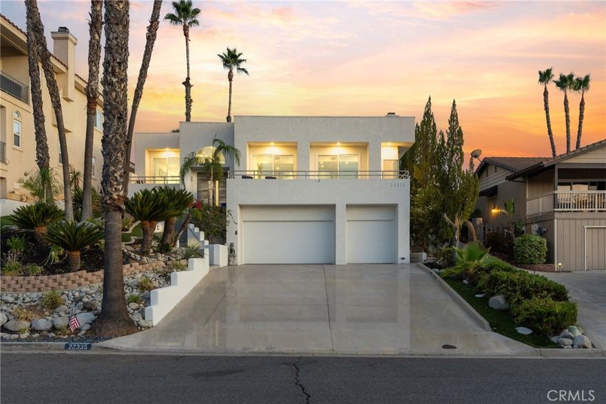 Welcome to 22335 Loch Lomond Drive in Canyon Lake—where resort-style living meets everyday comfort. With an impressive 2,814 square feet of living area this custom-built contemporary pool home offers three bedrooms, two and a half bathrooms, and a spacious three-car garage, all tucked inside one of Southern California’s only fully gated, waterfront communities.

Upstairs, the primary suite is a true retreat, featuring a private balcony, sitting area, large walk-in closet, soaking tub, and walk-in shower. Downstairs, two additional private bedrooms, including one with its own entrance—ideal for guests or multigenerational living. A fully remodeled spa-style bathroom with stone finishes serves the lower level. The home’s thoughtful layout, spacious open living spaces and large front deck with lake views make this home perfect for gathering, entertaining, or simply unwinding.

The backyard is an ultra private oasis with a sparkling pool and spa with fresh pebble plaster and custom tile, mature palm trees and low-maintenance landscaping. Inside, you’ll find wood flooring, granite counters, stainless steel appliances, skylights that flood the kitchen with natural light, and an oversized laundry room. The oversize 3 car garage with custom cabinetry and work space is ideal for your hobbies, or lake toys.

Canyon Lake offers an unmatched lifestyle with 15 parks, an 18-hole golf course, equestrian center, tennis complex, pool, marina, and year-round events like concerts, movies, and holiday parades. This home is perfectly located just a half-mile from Holiday Harbor with its beach, playgrounds, pavilions, amphitheater, and boat launch, and just a mile from the Canyon Lake Lodge, Lighthouse Restaurant, Sunset Lounge, and Tennis Club.

Beyond the gates, you’re minutes from shopping, dining, top-rated schools, and commuter routes—ideally situated between Temecula’s wine country and the growing cities of Murrieta and Menifee.

22335 Loch Lomond isn’t just a home, it’s a lifestyle—where every day feels like a vacation.