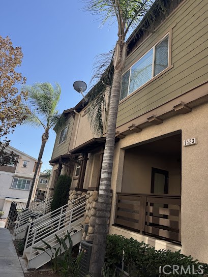 Excellent Cobblestone townhouse in prime and convenience location in Pomona. Adjacent to Claremont Shopping Center. 2006' built townhouse features 3 bedrooms and 2 1/2 bathrooms. Gated community. Upgraded throughout: wood floor, granite counter top. 2 attached garage with direct access. Bonus room on first floor. Inside Laundry. Must see to appreciate.
