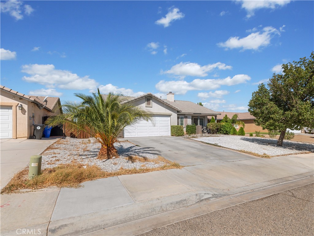 Charming Single-Story Home in the Heart of Adelanto. Welcome to this inviting 4-bedroom, 2-bathroom home, built in 2003 and thoughtfully designed for both comfort and functionality. Step inside to find a beautifully updated kitchen with granite countertops, seamlessly opening to the dining area and spacious living room—perfect for entertaining or everyday living. Cozy up by the fireplace on cool evenings or retreat to one of the four generously sized bedrooms. This home also features a convenient 2-car garage and sits on a large 7,200 sq. ft. lot, offering plenty of concrete space and a blank canvas for your personal touch—ideal for outdoor living or future upgrades. Don’t miss the opportunity to make this delightful property your next home!