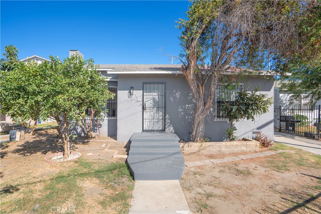 Two detached single story bungalows on one lot, front unit delivered VACANT at close of escrow. Tenants pay ALL UTILITIES including water, trash, gas, and electricity. This income producing property offers approximately 2,156 square feet of living space across two spacious two bedroom one bath units each with its own charm.
The front unit at 1,055 square feet has been completely remodeled inside and out with modern finishes, fresh paint, and a clean move in ready feel. This makes it ideal for an owner user who wants to live in one unit while earning rental income from the other. The rear unit at 1,101 square feet is tenant occupied at $859 per month providing immediate stable cash flow.
Built in 1947, both homes sit on approximately a 6,200 square foot lot with private drive access and parking for 10 or more cars. With the benefit of ZERO landlord utility expenses and the upside of remodeling already completed in the front unit, this property is a strong option for both investors and owner occupants