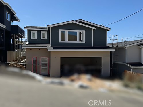 Rare opportunity to be the very first owner in a customized coastal home with unparalleled, birds eye views of the Pacific, including Morro Rock, Estero Bay, and Montana Del Oro. Building is nearly complete. There are expertly curated interior and exterior finishes. The amazing home plan layout features an upstairs open living area and gourmet kitchen with ocean views, pantry, laundry, and powder room, en-suite bedroom with bathroom and walk-in closet. There are two additional bedrooms downstairs and a full bathroom. The garage offers room for two cars plus additional storage and low-maintenance outdoor living areas.