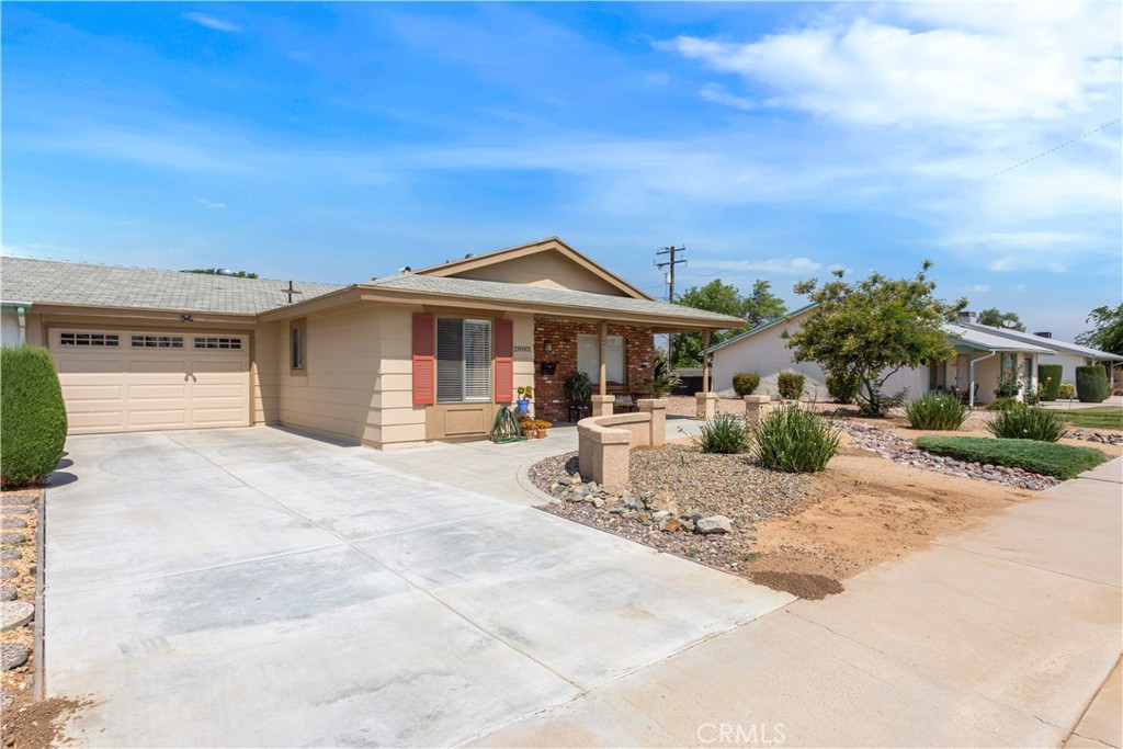 Lovely 2 bedroom 1 bath home located in the desirable Sun City Civic 55+ Community. The home has been professionally landscaped with drought resistance plants and shrubs which adds to the curb appeal. When entering the home, you are greeted by the beautiful laminate wood floors in the living room. The rally style kitchen is equipped with a dishwasher, electric stove top, refrigerator, an under the counter sink and the nook. The laundry is adjacent to the kitchen in the hall which leads to garage access from the home. The Main bedroom has direct access to the bathroom. The bathroom has a walk-in shower and a vanity. The secondary bedroom provides access to the backyard patio through the sliding glass door. You can also access the patio through the dedicated door in the garage. The large patio is fully covered. The backyard is fully fenced. This home is walking distance to shopping, banking, several restaurants, the club house and the Menifee public library. The garage wall is the only shared wall in this condo. Make an appointment today!