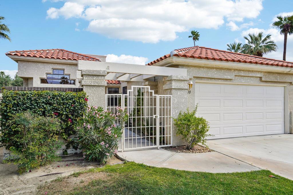OPEN HOUSE 10/18 & 10/19--12 -3pm!!This property is a must see located in the heart of Palm Desert, in the desirable community called The Courtyards in Desert Falls CC. Single level condo, sharing only one wall, shows like a single-family home offering over 2,000 sqft, Full 3 bedrooms, 2 full baths and a powder room. A long driveway, two car garage, and a private gated courtyard (updated landscaping from photos) entry greets you. Located in a cul-de-sac, Pristine best describes this property, naturally bright!! Vaulted ceilings throughout. Luxury vinyl plank flooring throughout. Great open floor plan! Fantastic kitchen, with slab granite counters, beautiful white shaker style cabinets set up to the ceiling! Plenty of cabinets, storage & a pantry. More than just a gorgeous kitchen, the breakfast nook overlooks the courtyard entry as well as a large window over kitchen sink looking out to the snowcapped mountains. Also, has a single French door entry! Kitchen opens to dining room and family room with gas fireplace. Large windows in dining room. Next to fireplace see a large corner wet bar and sliding glass door to spacious private patio. All in Neutral tones. Primary bedroom/suite has a two-way fireplace- into the bathroom (also updated since photos) with separate large shower and tub. Walk in closet. Also, slider leading to back patio.Guest bedroom located down a hallway, also with its own beautiful bathroom -(updated shower too!), and walk in closet, located on opposite side of property, nice for privacy. Third bedroom used as a den is located close to the entry. Terrific floor plan. Just across from a serene pool & spa area and a sort walk to the Clubhouse, next to the Health & Fitness Ctr, tennis courts and famous pickle ball! Which is included in your monthly HOA dues along with 24 hr. security, Cable tv with premium channels, all exterior and roof. Championship golf course, semiprivate club! Several memberships available or pay as you play or dine! Healthy, well-run association. Cannot state enough what a wonderful neighborhood this is. Short term rentals not available, but monthly rentals are!All furnishings can be available. With a location close to the JW Marriott, all kinds of shopping, several restaurants, minutes from renown Eisenhower Medical Campus, Acrisure Arena, casinos, Palm Springs A/P, and I- 10. Great as a Primary residence- or your vacation home or rental! ~Call now for your private tour! See you soon!