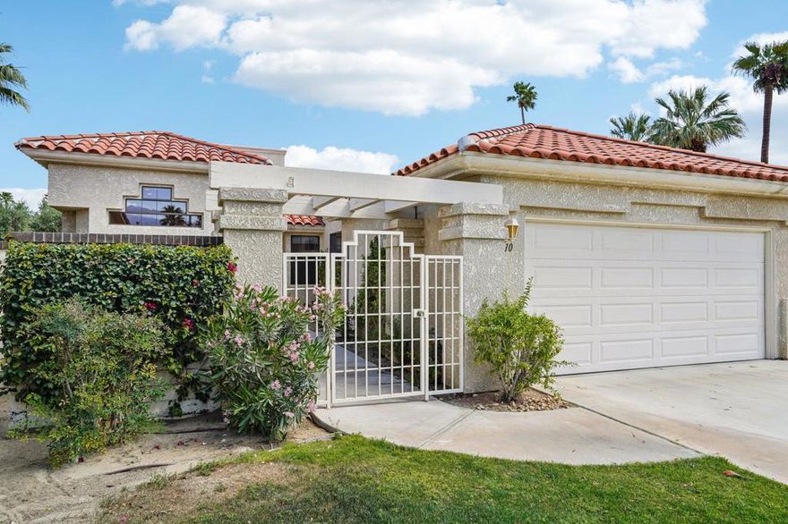 OPEN HOUSE 10/18 & 10/19--12 -3pm!!This property is a must see located in the heart of Palm Desert, in the desirable community called The Courtyards in Desert Falls CC.  Single level condo, sharing only one wall, shows like a single-family home offering over 2,000 sqft, Full 3 bedrooms, 2 full baths and a powder room. A long driveway, two car garage, and a private gated courtyard (updated landscaping from photos) entry greets you.  Located in a cul-de-sac, Pristine best describes this property, naturally bright!!  Vaulted ceilings throughout.  Luxury vinyl plank flooring throughout. Great open floor plan!  Fantastic kitchen, with slab granite counters, beautiful white shaker style cabinets set up to the ceiling!  Plenty of cabinets, storage & a pantry. More than just a gorgeous kitchen, the breakfast nook overlooks the courtyard entry as well as a large window over kitchen sink looking out to the snowcapped mountains.  Also, has a single French door entry!  Kitchen opens to dining room and family room with gas fireplace.  Large windows in dining room.  Next to fireplace see a large corner wet bar and sliding glass door to spacious private patio. All in Neutral tones.  Primary bedroom/suite has a two-way fireplace- into the bathroom (also updated since photos) with separate large shower and tub. Walk in closet.  Also, slider leading to back patio.Guest bedroom located down a hallway, also with its own beautiful bathroom -(updated shower too!), and walk in closet, located on opposite side of property, nice for privacy.  Third bedroom used as a den is located close to the entry.  Terrific floor plan.  Just across from a serene pool & spa area and a sort walk to the Clubhouse, next to the Health & Fitness Ctr, tennis courts and famous pickle ball! Which is included in your monthly HOA dues along with 24 hr. security, Cable tv with premium channels, all exterior and roof. Championship golf course, semiprivate club!  Several memberships available or pay as you play or dine! Healthy, well-run association. Cannot state enough what a wonderful neighborhood this is.  Short term rentals not available, but monthly rentals are!All furnishings can be available. With a location close to the JW Marriott, all kinds of shopping, several restaurants, minutes from renown Eisenhower Medical Campus, Acrisure Arena, casinos, Palm Springs A/P, and I- 10.  Great as a Primary residence- or your vacation home or rental! ~Call now for your private tour!  See you soon!