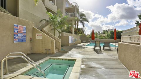 Photo of 2222 N BEACHWOOD Drive #408, Los Angeles, CA 90068 (MLS # 26661527)