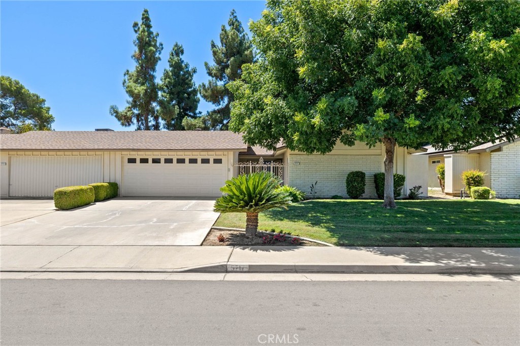 Charming Kern City home on the Golf Course! Offering 2 big bedrooms, plus an office, and a flex room overlooking the greenery of the course - perfect for a small den or library area. This home has the luxury of remodeled kitchen cabinets, and for energy efficiency, you'll enjoy updated windows and a beautifully redone fireplace that really puts out the heat! This home presents a very open floor plan that is warm and inviting and just the perfect place to call home! Enjoy new landscaping and freshly paint areas. The Kern City homeowners association offers a club house, swimming pool, and activities, and you'll be just a few blocks from grocery stores, restaurants and banks. It will be hard to beat this Golf Course home, book your appointment today!