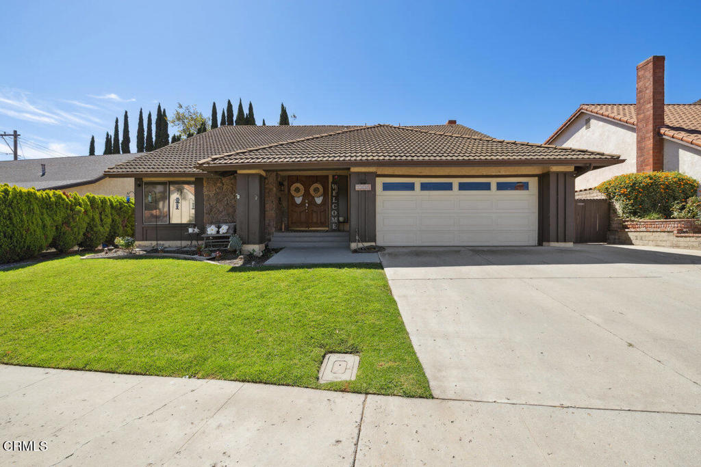 Built in 1977, spacious 2,333 sq ft two-story home sits on a 6,534 sq ft lot. All 4 bedrooms are located upstairs, including 2 full bathrooms. The main level features a half bathroom, living room with soaring two-story ceilings, a formal dining room, and a kitchen that overlooks the backyard. There's also another eating area situated between the kitchen and family room. The family room includes a fireplace, wet bar with a sink and expansive windows that provide plenty of natural light and views of the backyard. A separate laundry room offers built-in shelving for hanging clothes and organizing laundry essentials. Interior upgrades include fresh paint from three years ago, updated light fixtures, newer carpet, and a tiled entryway that flows toward the kitchen and backyard. Exterior highlights include RV parking and additional private parking, which could also function as a dog run. The beautifully landscaped backyard features a variety of fruit-bearing trees, Japanese maple, apple, apricot, nectarine, lemon, lime, and pomegranate, as well as vibrant blue and pink hydrangeas. Privet hedges have been thoughtfully planted to grow up to 20 feet for added privacy. For outdoor entertaining, the backyard includes a covered patio with built in lighting, perfect for year round enjoyment, and a built-in brick BBQ. The spa features a brand-new heater that warms up in just 10 minutes, offering quick and easy relaxation.