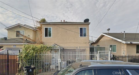 Photo of 1462 E 98th ST, Los Angeles, CA 90002 (MLS # OC26179269)