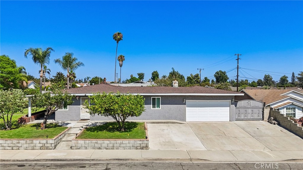 Welcome to 1260 Lincoln Ave, a spacious single-story home located on a corner lot in one of Pomona’s most desirable neighborhoods, just minutes away from the charming Claremont Village. This well-maintained residence features three generously sized bedrooms and two recently updated bathrooms. The bright and open living room flows seamlessly into the kitchen, while a large family room is highlighted by a beautiful fireplace and direct access to the backyard. The expansive outdoor space is perfect for both relaxation and entertaining, featuring a covered patio, multiple fruit trees, and plenty of room for hosting gatherings. Additional amenities include a 2-car attached garage, gated RV parking, ample off-street parking, and inviting curb appeal with a large covered front porch. With a combination of comfort, functionality, and an ideal location near shops, dining, and top-rated schools, this property presents a rare opportunity to own a truly versatile and welcoming family home.