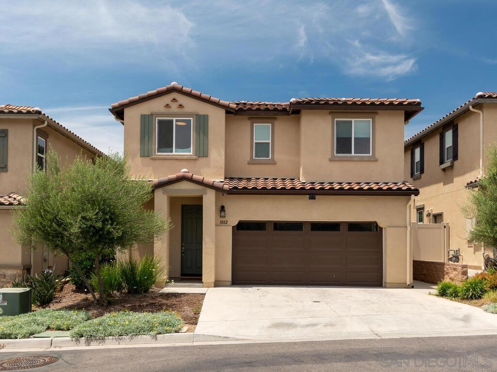 Welcome to 1882 Emily Street, a beautifully appointed 4-bedroom, 2.5-bath home in the picturesque Main Ranch community of El Cajon. This modern residence offers a bright, open-concept layout designed for comfort and style. The chef’s kitchen features a large island with bar seating, reverse osmosis system, and premium appliances, including a GE Café range with double oven, LG Smart dishwasher, and LG Instaview refrigerator. The adjacent dining area offers the perfect gathering spot for meals and conversation. Upstairs, enjoy a versatile loft, ideal as a home office or playroom. The luxurious primary suite serves as your private retreat, complete with a dual vanity, walk-in shower, and expansive walk-in closet. A dedicated laundry room adds convenience, while a unique hidden closet provides discreet storage ideal for valuables and safes. Energy-smart upgrades include a whole-house fan, water softener/filtration system, and a 240V EV outlet in the garage. Step outside to one of the largest backyards in the community, recently upgraded with low-maintenance turf, elegant pavers, and a stylish pergola. It’s an ideal setting for outdoor entertaining or quiet evenings under the stars. Located in a vibrant, well-maintained neighborhood with a children’s playground, this home offers the perfect combination of lifestyle, comfort, and convenience. Don’t miss the opportunity to call this stunning Main Ranch property your next home! Welcome to Main Ranch, one of El Cajon’s most desirable newer communities, where peaceful living meets modern convenience. Nestled in the hills, this charming neighborhood offers beautifully designed homes, mountain views, and a true sense of community. Residents love the quiet streets, friendly atmosphere, and close-knit feel where neighbors know each other and pride of ownership shines. Located just minutes from downtown El Cajon and with easy access to freeways, shopping, dining, and great schools, Main Ranch strikes the ideal balance between convenience and tranquility. Plus, outdoor enthusiasts will appreciate being close to some of San Diego County’s best hiking trails, parks, and natural open spaces.