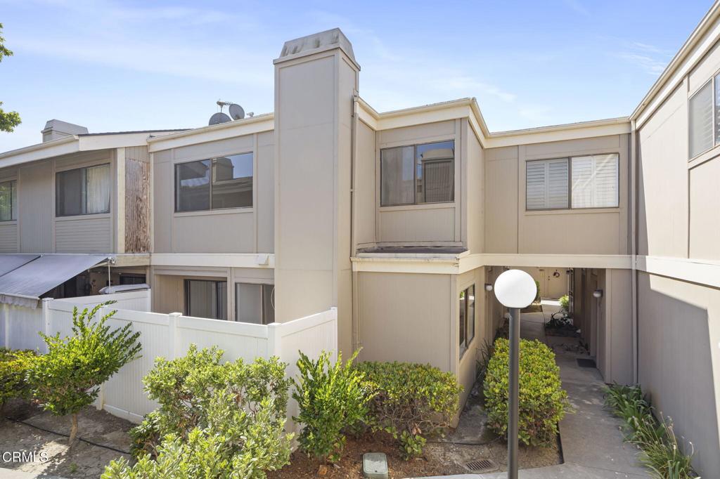 Welcome to 1466 San Simeon Way #4, a beautifully refreshed condo located in the desirable Ralston Village community. This charming and well-maintained two-bedroom, one-and-a-half-bathroom home offers nearly 1,100 square feet of thoughtfully designed living space with tasteful updates throughout.Step inside to find brand new luxury vinyl plank flooring, fresh interior paint, and updated lighting fixtures that create a warm and inviting atmosphere. The spacious living room features a cozy fireplace and opens to the dining area, which flows seamlessly to a private fenced patio--ideal for relaxing or entertaining. The bright kitchen offers generous cabinet space and stainless steel appliances. Upstairs, you will find two comfortable bedrooms with ample closet space, an updated full bathroom, and a convenient vanity area in the primary bedroom. The downstairs powder room has also been stylishly updated. Additional highlights include an in-unit laundry closet and a detached two-car garage located directly across from the unit. Residents of Ralston Village enjoy access to community amenities such as a swimming pool and greenbelt areas. The HOA has been completing approved upgrades throughout the association with newly paved roads just being completed. This home is ideally located near shopping centers, parks, schools, and the Ventura County Government Center, with easy access to the 101 and 126 freeways for a smooth commute. Just a short drive from Downtown Ventura, local beaches, and marinas, this is truly the best value you will find in Ventura.