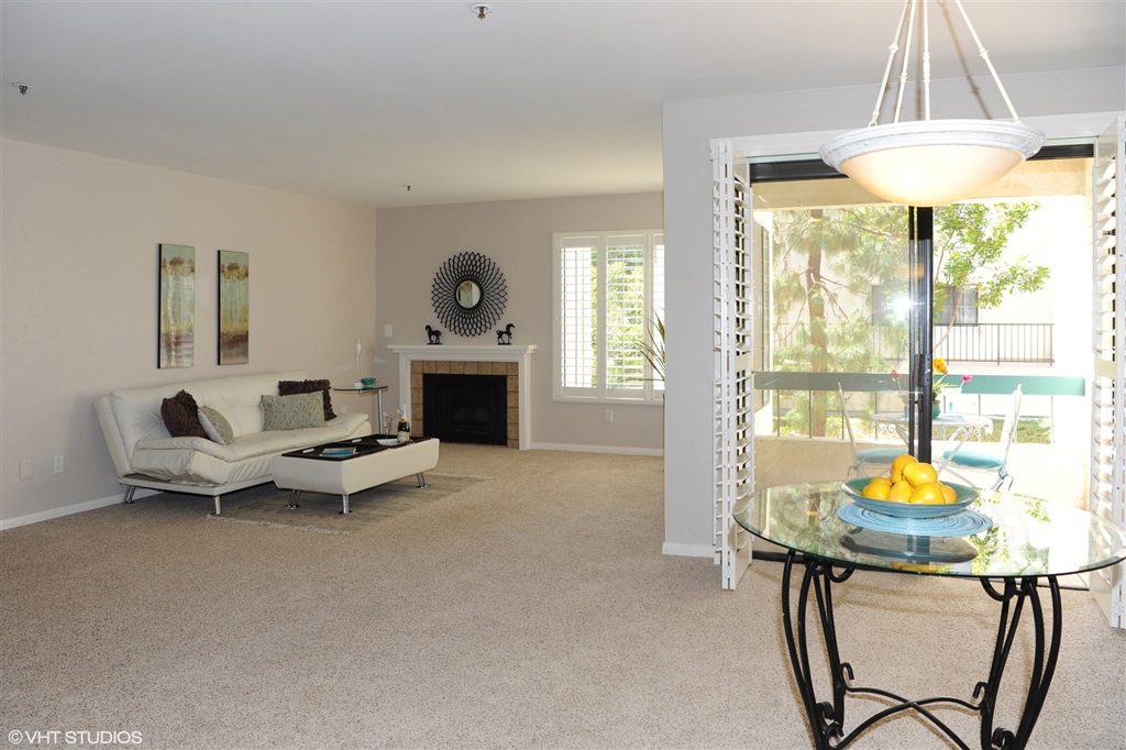 Lovely end unit has many upgrades throughout! Recently remodeled kitchen has beautiful, full hardwood cabinets with gorgeous granite counters! Stainless steel appliances with fancy Samsung French-door refrigerator that all convey with unit! Custom built-in, living room dry bar also remodeled with matching cabinetry & counters enhances the large, great-room floorpan! Gorgeous plantation shutters throughout! Upgraded lighting! Cozy fireplace in living room! See supp for more... Formal dining area/great room opens to another balcony with peek views to greenbelt space & toward canyon & Admiral Baker Golf Course! Master en suite bedroom is huge with two sets of wall closets, and a slider out to a large balcony, also remodeled with custom tile work! Ceilings beautifully re-textured and entire interior cleaned and freshly painted! Move-in ready! Some of the fantastic complex amenities include a huge, gated, canyonside pool, spa & tennis courts, with view of Admiral Baker Golf Course! HBO & Showtime & Internet service included too! Secure, elevator building with gated underground parking (2 assigned spaces (marked 33) are next to elevator bay closest to unit!). Neighborhoods: Tierrasanta Complex Features: ,,,,,,,,,, Equipment: Dryer,Fire Sprinklers,Garage Door Opener, Washer Other Fees: 0 Other Fees Type: , Sewer: Sewer Connected Topography: LL