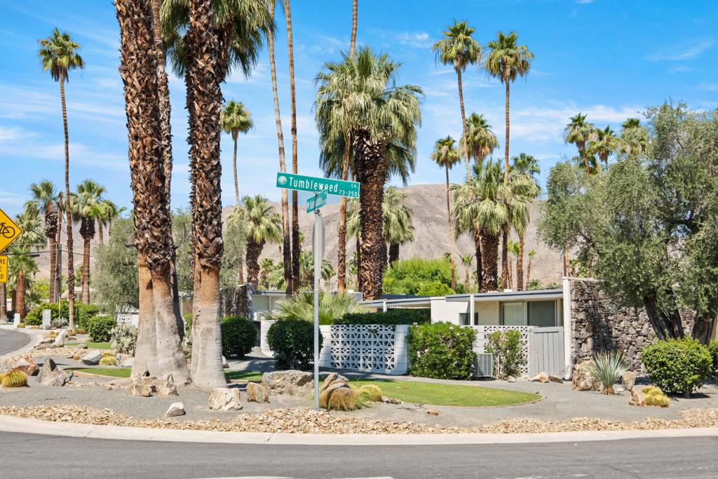 ADORABLE MID-CENTURY MODERN GETAWAY. Great for full time living or just a relaxing weekend. EXCELLENT LOCATION! Walkable to all the action on El Paseo. Shopping, restaurants, entertainment and much more. This two bedroom/two bath over looks the beautiful community pool. It includes unique views of the mountains. There is a single car garage. The laundry is inside the unit. All this is setting in a serene and quiet setting. Great investment property! Come take a look..... you will not be disappointed.