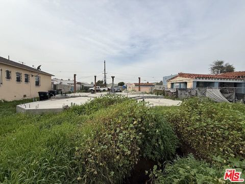 Photo of 10965 S Hoover Street, Los Angeles, CA 90044 (MLS # 26641495)