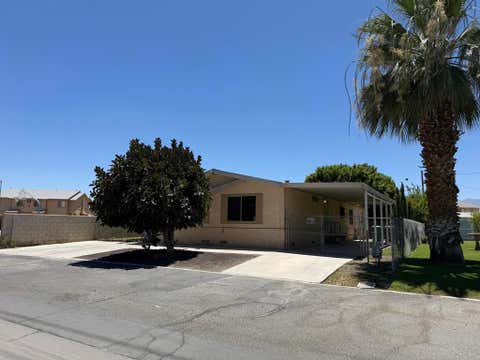 Photo of 86037 Palmeras Circle, Coachella, CA 92236 (MLS # 219149651DA)