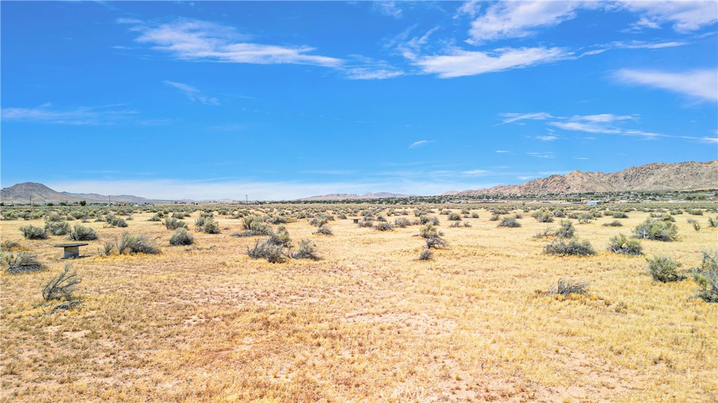 Leave the city behind and build your dream home under clear skies and starry nights! This 2.27-acre horse property in Apple Valley offers the perfect canvas for your custom home, workshop, and even an ADU. There's space for horses, chickens, gardens, a pool, and all your off-road toys. Enjoy peace and privacy while staying just 15 minutes from the 15 Freeway, 10 minutes to shopping, and near year-round adventures in the Wrightwood Mountains. Start building now and celebrate Christmas 2025 in your brand-new home! APN: 0437-062-41-0000