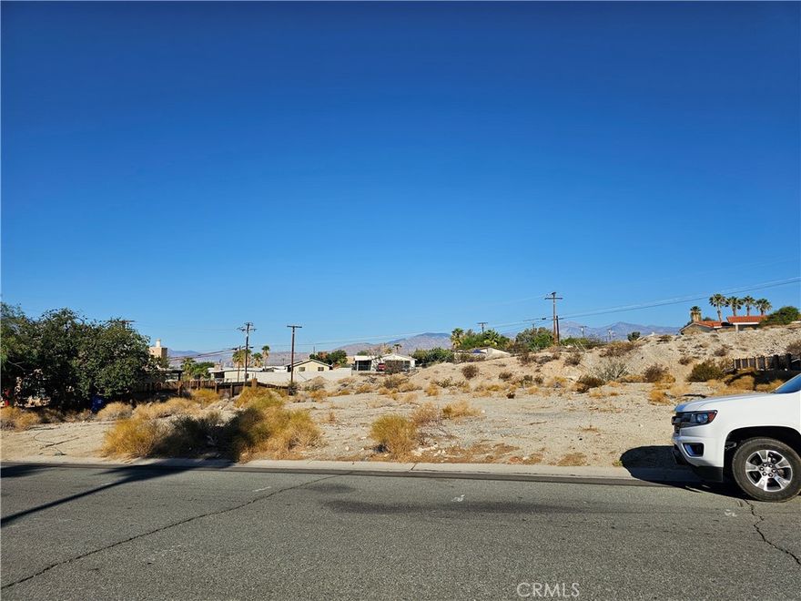 Fantastic opportunity to own a .26-acre flat and usable lot in the growing community of Desert Hot Springs! Situated on a paved road with curbs, this parcel is ready for development, surrounded by existing homes on both sides. Enjoy beautiful mountain views and a peaceful desert setting, all while being conveniently close to natural hot springs resorts, shopping, dining, and other local amenities. Whether you're an investor looking for your next project or a homeowner ready to build your dream home, this spacious lot offers endless potential in a prime location. Don’t miss out!