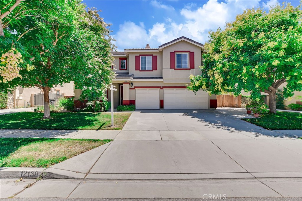 SUPER CLEAN CENTEX BUILT CHINO HOME - This original owner home has approximately 3,300 square feet of living area and a LARGE LOT to relax. Has area to place a 5th bedroom if needed. Property has 4 Bedrooms and 3 Bathrooms. The property has newer distressed wood throughout the home with the exception of bathrooms that have 18 inch horizontal travertine coverings. Has a large living room with recessed lighting and dual pane windows. Kitchen with oak cabinets, granite countertops, 6x5 Island that can be used as breakfast counter, walk in pantry, 4 burner free standing stove with hood, dishwasher, refrigerator and overlooks the grand family room and the back yard. Large Family room with granite faced fireplace, has a beautiful mantle, recessed lighting and ceiling fan. Has a large individual laundry room with sink and folding area. Large master bedroom with double door entry and 2 separate closets, one is a large 9x9 walk in closet and the other is a double sliding mirrored closet area. Master bath with separate shower and tub, dual sinks with granite counters and powder area between sinks. Other 3 bedrooms have sliding mirrored closets. Hall bath has dual sinks with granite countertops. Also has a large 22x16 retreat upstairs that can be used as a game room, theatre room, 2nd family room or 5th bedroom... Has a 3 car garage with 2 EV plugs, auto garage door opener on the 2 car garage area. Gated RV parking. Tiled Roof. The back yard has a cedar wood Gazebo and a Pergola. No HOA's and No Mello-Roos. Easy access to 60 Freeway, Restaurants and shopping.