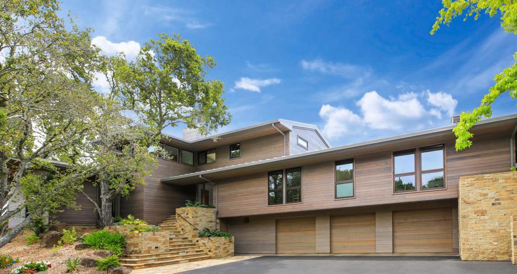 Rare to find...enjoy central Woodside with mountain views + SF Bay views. Quiet park-like grounds on 2.97 acre lot. Expansive flat back yard area (~1.5 acres) enjoys ideal sun throughout the day and includes pool, spa, large lawn area, al fresco dining patio and tennis court. The residence is fully remodeled. Stunning modern design and open floor plan with 4 Fleetwood wall systems that open the residence to the outside to enjoy the natural surroundings. 5 Bedrooms + 5.5 Bathrooms + Office + Bonus room + wine cellar + oversized 3-car garage. Attached pool house/guest house features family room, bedroom, kitchen, full bath and private entrance. Next to open space with 100's of miles of trails. 3 horse barn and pasture. A remarkable property in a private, peaceful setting.