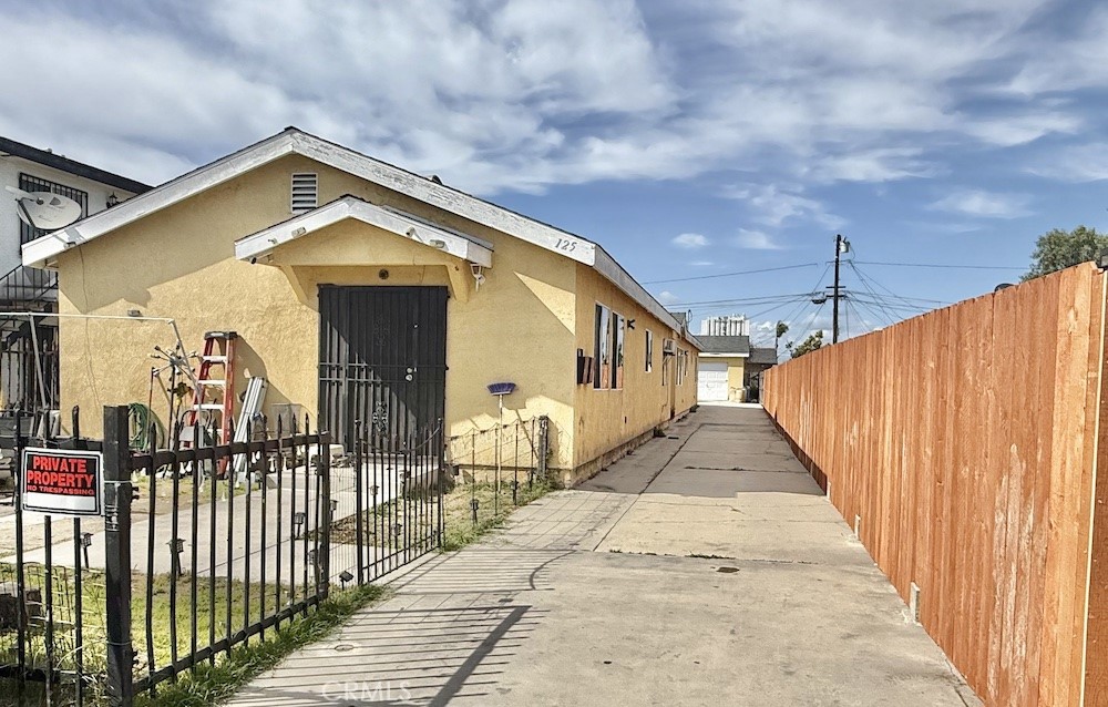Amazing 2007 built duplex. Consists of 2 large units (approximately 1250 sf each), both 3 bedroom 1 bath. One unit comes with an attached 1 car garage, includes an additional 1 car garage and 2 car garage, for a total of 4 garage spaces! Also room for multiple cars in the driveway. Both units are occupied by long term tenants. Low maintenance building consists of a stucco exterior and concrete driveway. New fence on right side of property. Close to shopping, great street. Do not disturb tenants, drive by only. Interior inspection upon accepted offer. Possible ADU above back garages, confirm with city.