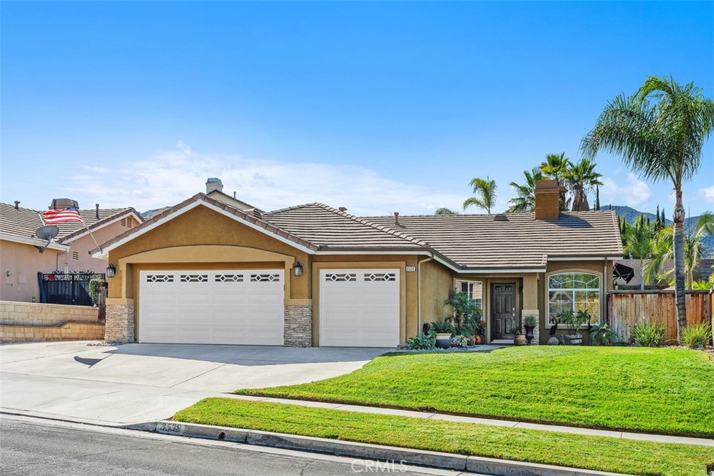 When you walk into this single-level pool home, you’ll know you’ve found the one, just like my clients did. It started the moment they pulled up: the wide, tree-lined streets of Corona’s Mountain Gate neighborhood, the manicured front yard, and that generous driveway with RV parking, three-car garage, and beautiful landscaping. It just felt right. Step inside, and you’ll feel it too. The living room welcomes you with high ceilings, a cozy two-way fireplace, and French doors that open to a sunny side yard, perfect for a morning coffee or evening glass of wine. Slate and tile flooring (with soft carpet in all the right places) tie the home together in cool, timeless style. Continue on, and you’ll find the dining area and family room opening to a remodeled kitchen complete with a breakfast bar, quartz counters, and a cheerful nook overlooking your private backyard oasis. Down the hall, two comfortable bedrooms and a full bath offer space for family or guests, while the large primary suite is your own retreat, featuring a walk-in closet, a second full-length closet, and French doors leading to the pool area. And then, there’s the backyard. This is where the love story really began. Imagine relaxing in the sparkling pool and spa, gathering around the firepit, or firing up the built-in BBQ while the kids or grandkids play on the grassy lawn. The flagstone patio has been freshly sealed, and the pool just received a new electric salt-cell panel. For the garden lover, stairs lead up to a hillside ready for your favorite fruit trees. The owners have lovingly cared for this home, and it shows in every detail. Now, it’s ready for the next chapter....yours!
