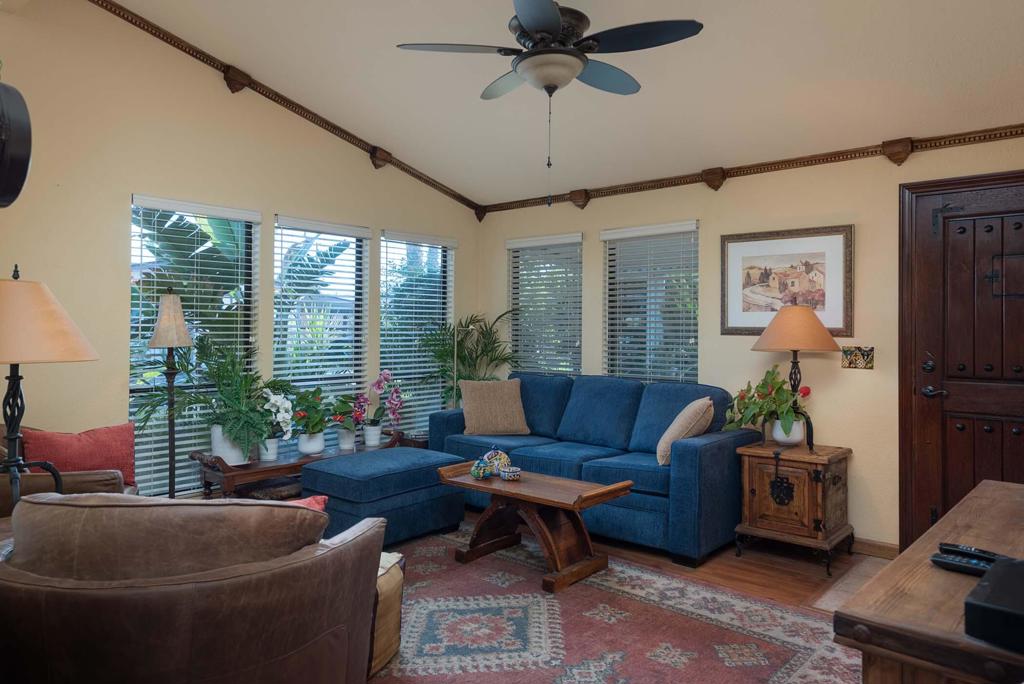 This home is truly one of a kind, as you enter through the tiled patio, you get a flavor of the inside by the Wooden Front Door, as you enter you notice the warmth of the wooden crown molding throughout the entire home. The Spanish style true wooden furniture and decorative festive pottery will have you ready for Margarita's and Relaxation. This 2BD/2BA home has 1140 sq feet. The front living room and front loaded kitchen look out onto the lush tropical landscape. This home is sold completely furnished and ready for move in. The Hallway Bath has a step in shower and is convenient to the guest bedroom. There is a full sized Washer/Dryer behind folding closet doors. The Large Primary Suite has a full wall closet and dual sinks with both soaking tub and step in shower. The Kitchen features white appliances with Stove, Refrigerator and counter-top Microwave. The Dining Room table is Solid Wood and has 6 chairs for serving dinner with guests. The upgraded Dual Pane Sliding Door with built in blinds leads you to the carport sitting area with green plants and warm decorative art. The opposite side patio is private with mature landscaping and a wonderful fountain for entertainment or afternoon reading enjoyment. There is a large walk in storage shed, with tile floor and hot & cold water. This home has a newer A/C System, and has been well maintained and updated nicely. The Canyon is centrally located in the Valley and has easy Freeway access on Gene Autry Trail or Date Palm Dr. We are near shopping, entertainment, PS Int'l Airport and 10-12 Min. to Downtown Palm Springs! The Canyon features only Full-Time Residence or Second Homes. We have wonderful park like greenbelt grounds with Tennis & Pickleball. Our clubhouse boasts an upgraded Banquet Hall, Gym, Card Room and Library along with 4 Enclosed Heated and Cooled Shuffleboard Lanes, Two pools and a Spa. You will need to qualify as a resident with 3 times space rent $950 = $2850 along with a FICO score of 750. One domestic animal of 20 lbs unless it is a Service Dog. The Canyon is the place to be for 55+ Adult Lifestyle Living. Make an OFFER Today!!