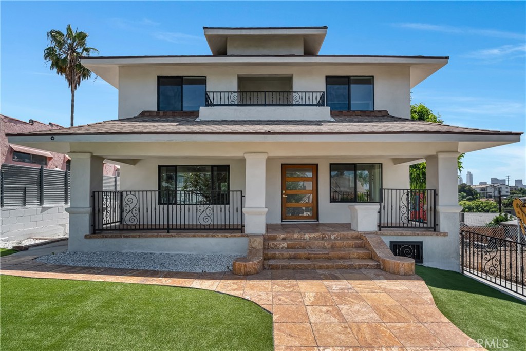Introducing a rare opportunity in the heart of Silver Lake—this beautifully remodeled 1909 Craftsman-style home seamlessly blends historic charm with modern upgrades. Offering approximately 2,062 sq ft of living space, this two-story residence features 4 spacious bedrooms, 3 updated bathrooms with marble finishes, a full covered front porch, and exquisite real wood built-ins with marble countertops. The home also includes a unique attic and basement, adding character and versatility. Complementing the main residence is a detached 1-bedroom, 1-bath ADU built in 2020 (692 sqft)—perfect for additional rental income or extended family living. Situated on an RD1.5-zoned lot, this property offers outstanding potential for future development. Enjoy stunning downtown skyline views, walkability to Sunset Blvd’s trendy cafes and restaurants, and quick freeway access. Whether you're looking for a forever home, income-producing property, or a prime development opportunity, this Echo Park gem delivers unmatched potential in one of L.A.’s most sought-after neighborhoods.
