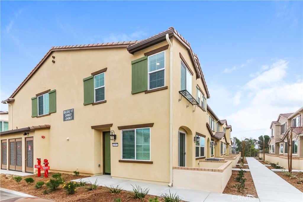 This home is professionally managed by Tricon Residential, dedicated to creating exceptional rental experiences. Featuring three bedrooms, two and one half bathrooms, and approximately 1,474 square feet, this townhome offers a high standard of rental living, supported by a team that puts residents first. Tricon Wildomar is a beautiful Spanish-inspired gated community centrally located just one hour from San Diego and Orange County. Enjoy virtually maintenance-free living with the conveniences of solar and smart home technology including automatic thermostat control and keyless front door entry all designed to provide an exceptional living experience. Every home includes an open-concept design, gourmet kitchens with quartz countertops and stainless steel appliances. Enjoy well-maintained amenities including a sparking pool with wifi, tot lot/playground, dog park, fitness center and clubhouse with rentable event space.