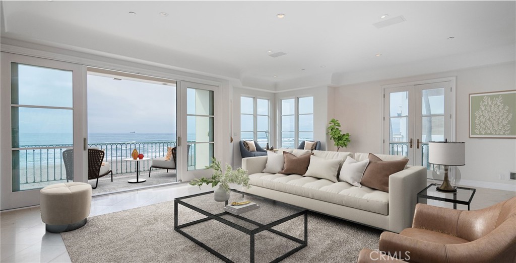 Welcome to your slice of paradise on The Strand in the heart of Manhattan Beach, where coastal elegance meets Mediterranean charm in this breathtaking corner lot waterfront residence. Nestled in one of the most coveted locations in Manhattan Beach, this stunning home features a separate 2 bedroom, 2 bath unit with its own 1 car garage. The main house is a 4-bedroom, 5-bathroom home with a 3-car garage. The home exudes luxury and sophistication at every turn. As you step inside, you're greeted by an open floor plan that seamlessly blends the indoors with the outdoors, creating a perfect space for entertaining and relaxation alike. The chef's kitchen is a culinary masterpiece, boasting high-end commercial-grade appliances that cater to the most discerning tastes. Ascend effortlessly between floors with the two-stop circular glass elevator, adding a touch of modern convenience to the timeless allure of the home. The entire third story is dedicated to the lavish master suite, offering unparalleled privacy and serenity with its expansive layout and panoramic views of the azure waters beyond. Wine connoisseurs will delight in the expansive wine cellar, a sanctuary for storing and showcasing your prized collection in impeccable style. Whether hosting intimate tastings or simply savoring a glass in solitude, this cellar is sure to be a cherished feature of the home. Warmth and ambiance permeate through the home with two cozy fireplaces, perfect for chilly coastal evenings spent with loved ones. Step outside into the inner courtyard patio, where a built-in BBQ invites al fresco dining amidst tranquil surroundings. The spacious ground level family room serves as the second heart of the home,providing a warm and inviting atmosphere for gatherings large and small. With seamless access to the outdoor living area, you'll find yourself effortlessly transitioning from indoor relaxation to outdoor enjoyment, where the gentle sea breeze and breathtaking views create an ambiance like no other. The outdoor living area is a true oasis, providing ample space for soaking in the California sun or hosting gatherings against the backdrop of sweeping 180-degree white water views. Just steps from the sand, where each day and every sunset brings a new opportunity to revel in the beauty of coastal living. Experience the epitome of luxury beach living in this exquisite waterfront home, where every moment is infused with the timeless charm of Manhattan Beach.